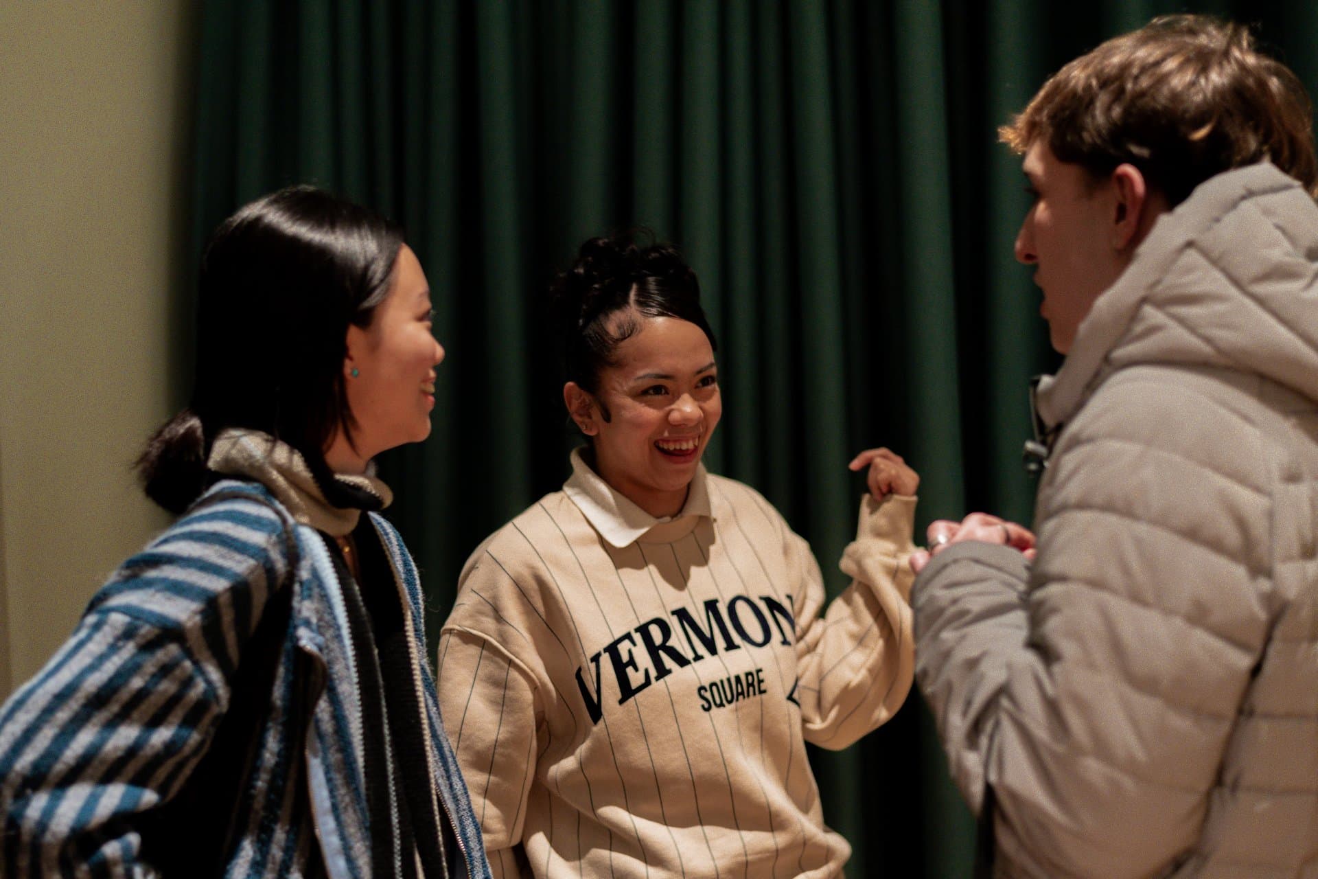 Diverse creative team working on multimedia storytelling projects